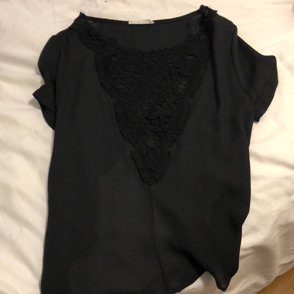 Open back black top
